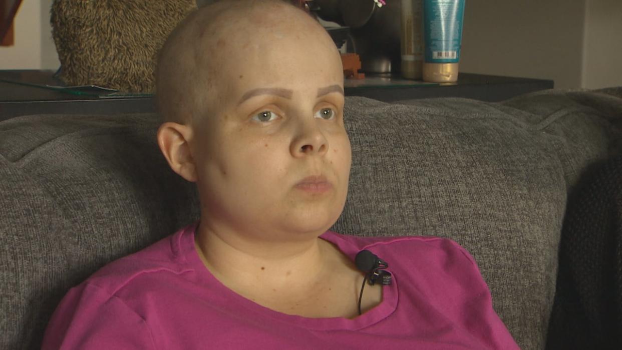 Emma Mann was told by the scammer on the other end of the phone that there were fraudulent charges on her Scotiabank account. She was told to buy gift cards in order to correct the problem. (Rob Killorn/CBC - image credit)