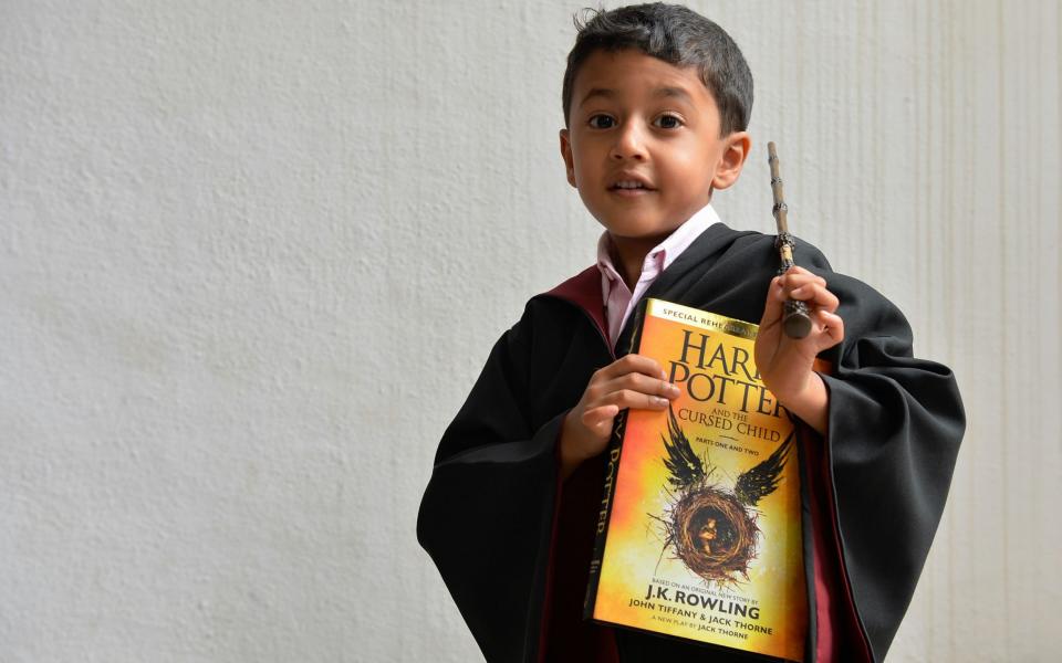 Harry Potter cast a spell over swathes of the world’s readers, including this young Indian fan of the books - Credit: MANJUNATH KIRAN/AFP