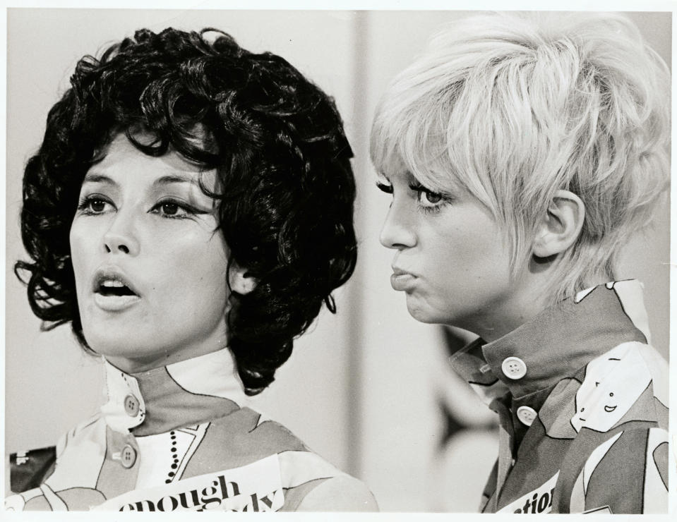 Guest star France Nuyen sings out in tribute to the Fourth Estate while serious regular Goldie Hawn gives the matter thoughtful consideration on Rowan and Martin's Laugh-In