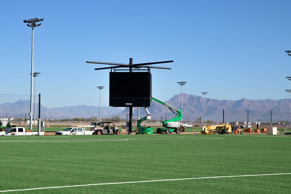 Big screens under construction on the football, soccer and lacrosse fields at Bell Bank Park on Dec. 16, 2021. The park is a Legacy sports and entertainment complex set to open in January 2022 in Mesa.