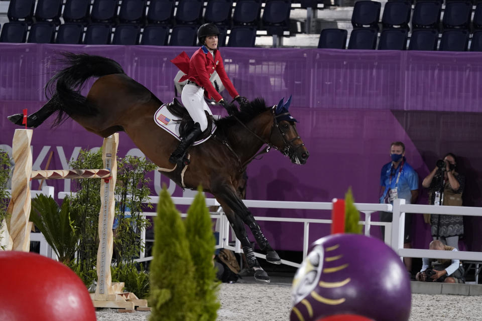 United States' Jessica Springsteen, riding Don Juan van de Donkhoeve, competes during the equestrian jumping individual qualifier during the 2020 Summer Olympics, Tuesday, Aug. 3, 2021, in Tokyo, Japan. (AP Photo/Carolyn Kaster)