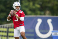 Indianapolis Colts quarterback Brett Hundley throws during practice at the NFL team's football training camp in Westfield, Ind., Saturday, July 31, 2021. (AP Photo/Michael Conroy)