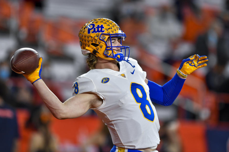 Pittsburgh quarterback Kenny Pickett warms up before an NCAA college football game against Syracuse in Syracuse, N.Y., Saturday, Nov. 27, 2021. (AP Photo/Adrian Kraus)