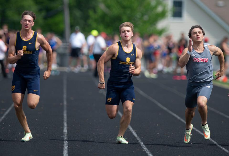 Streetsboro's Micah Schuster and Preston Hopperton compete with Crestwood's Louie Blasiole in the 100-meter finals at the Division II track & field championships at Lakeview on Saturday, May 21, 2022.