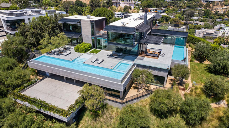 Another shot of the home and its pair of outdoor pools.