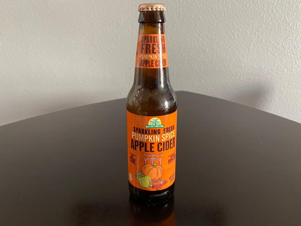 orange and brown bottle of aldi sparkling apple cider