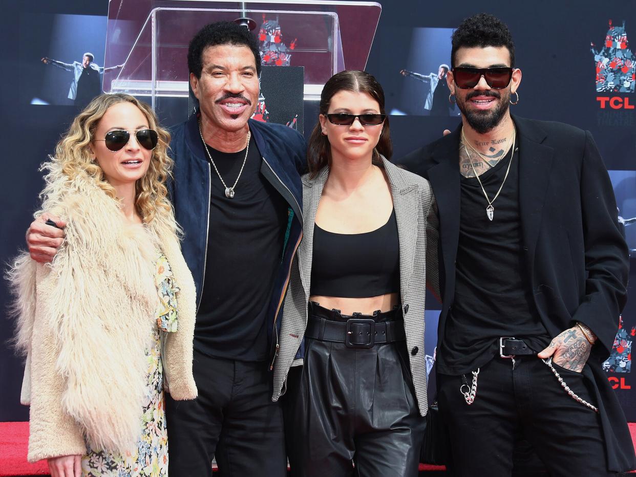 Nicole Richie, Lionel Richie, Sofia Richie and Miles Richie attend the Lionel Richie Hand And Footprint Ceremony at TCL Chinese Theatre on March 7, 2018 in Hollywood, California