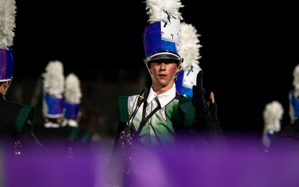 Fossil Ridge High School band members perform at halftime during a football game against No. 3 Grandview at PSD Stadium on Sept. 1 in Timnath.