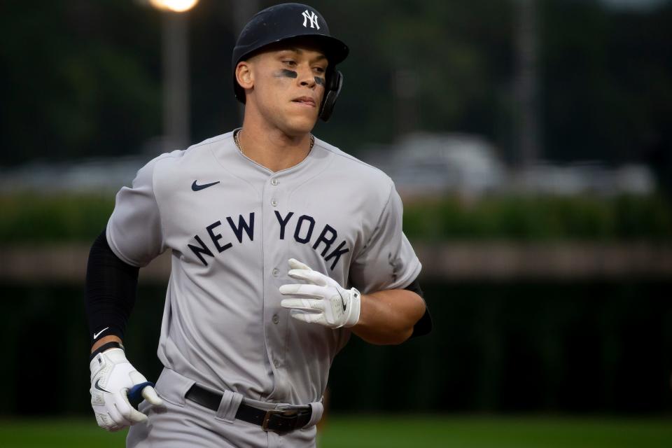 The New York Yankees Aaron Judge rounds the bases after hitting a home run during their baseball game against the Chicago White Sox at the new MLB field next to the Field of Dreams movie site on Thursday, Aug. 12, 2021 in Dyersville, IA.