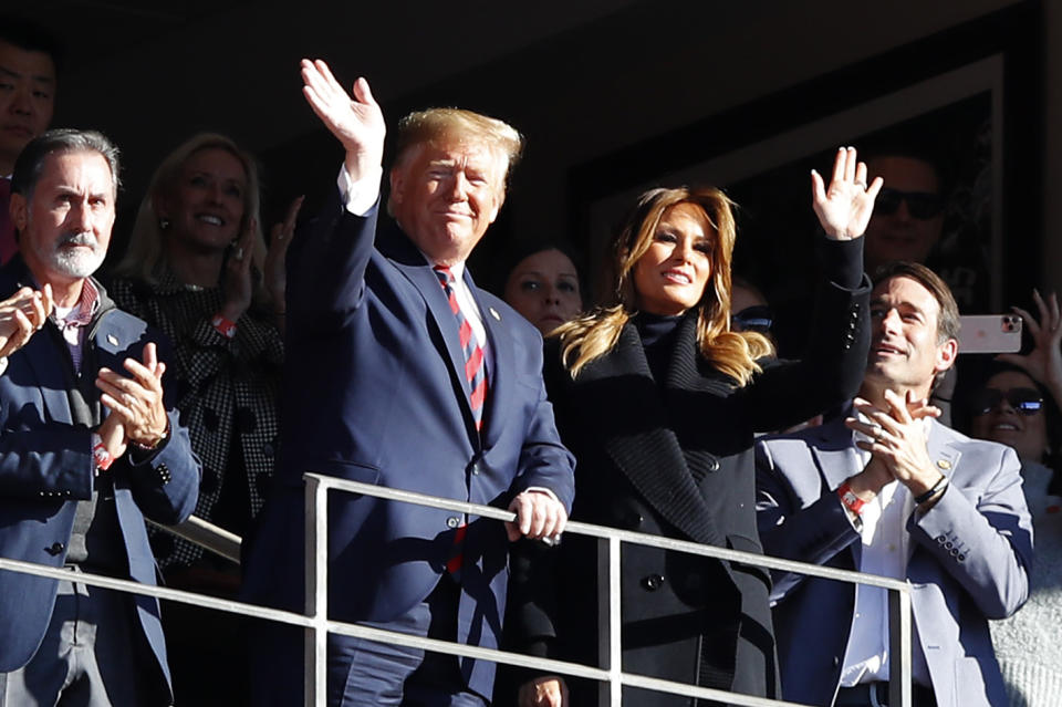 President Trump, seen here at last year's Alabama-LSU game, and Michael Bloomberg will be making a huge campaign ad push in the Super Bowl. (Kevin C. Cox/Getty Images)