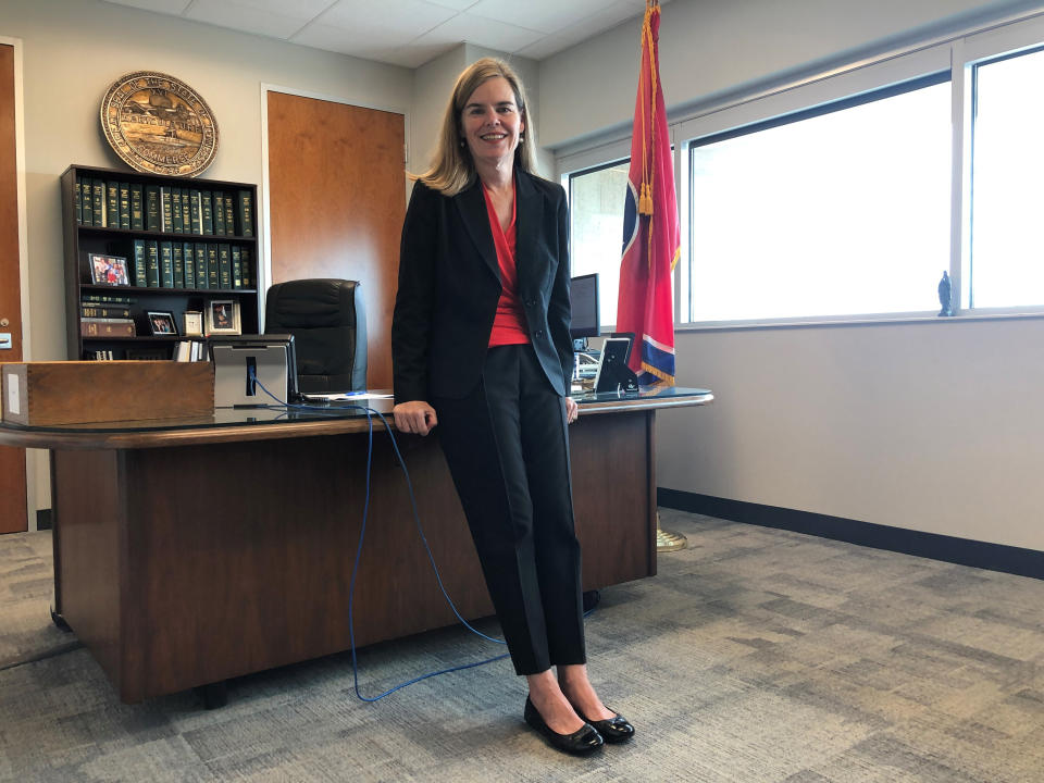 FILE - Shelby County district attorney Amy Weirich poses for a photo in her office on Aug. 1, 2022, in Memphis, Tenn. Steve Mulroy, a candidate for district attorney in Shelby County, defeated incumbent Weirich in Thursday’s Aug. 4 election, after a contentious race that featured clashes over abortion prosecutions as well as a new state law requiring strict sentencing for violent crimes and other issues. (AP Photo/Adrian Sainz, File)