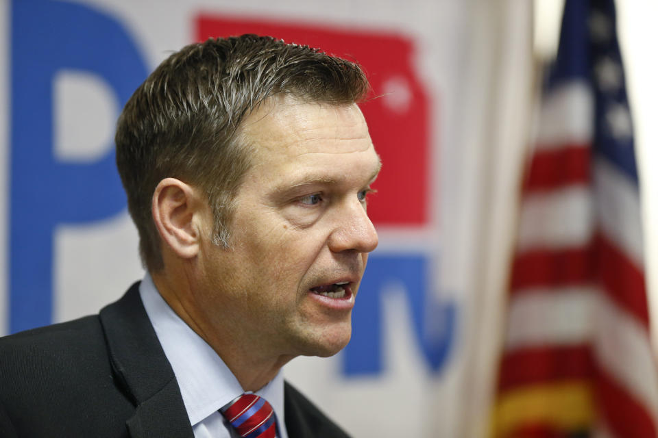 Republican gubernatorial candidate Kris Kobach announces proposals to impose work requirements, drug testing and immigration requirements for participation by Kansans in Medicaid during a press conference Wednesday, Oct. 17, 2018, at the Kansas GOP headquarters in Topeka, Kan. (Chris Neal/The Topeka Capital-Journal via AP)