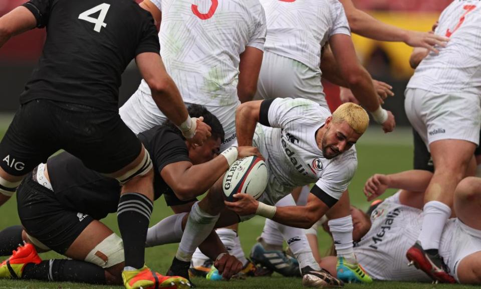 USA’s Nate Augspurger, who the All Blacks’ Damian McKenzie called a ‘tough bugger’ after the game, is taken down