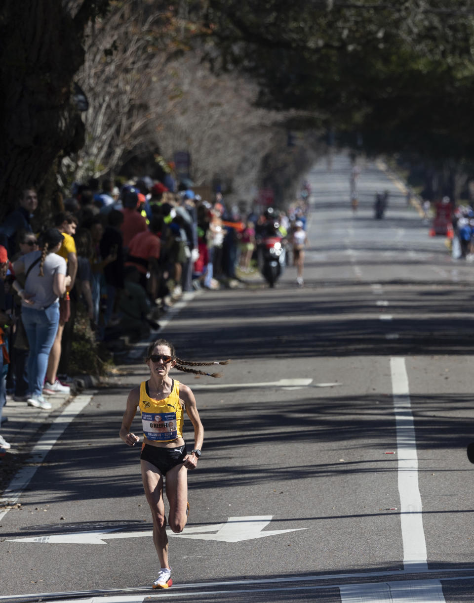 Fiona O'Keeffe extends her lead during the U.S. Olympic marathon trials in Orlando, Fla., Saturday, Feb. 3, 2024. O’Keeffe finished in a time 2 hours, 22 minutes, 10 seconds to break the American marathon trials mark of 2:25:38 set by Shalane Flanagan in 2012 in Houston. (Willie J. Allen Jr./Orlando Sentinel via AP)