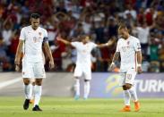 Robin van Persie (L) and Wesley Sneijder (R) of the Netherlands react after Turkey's second goal during their Euro 2016 Group A qualifying soccer match in Konya, Turkey, September 6, 2015. REUTERS/Umit Bektas