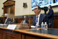Treasury Secretary Steven Mnuchin gives an opening statement before a House Financial Services Committee hearing on Capitol Hill in Washington, Wednesday, Dec. 2, 2020. (Greg Nash/Pool via AP)