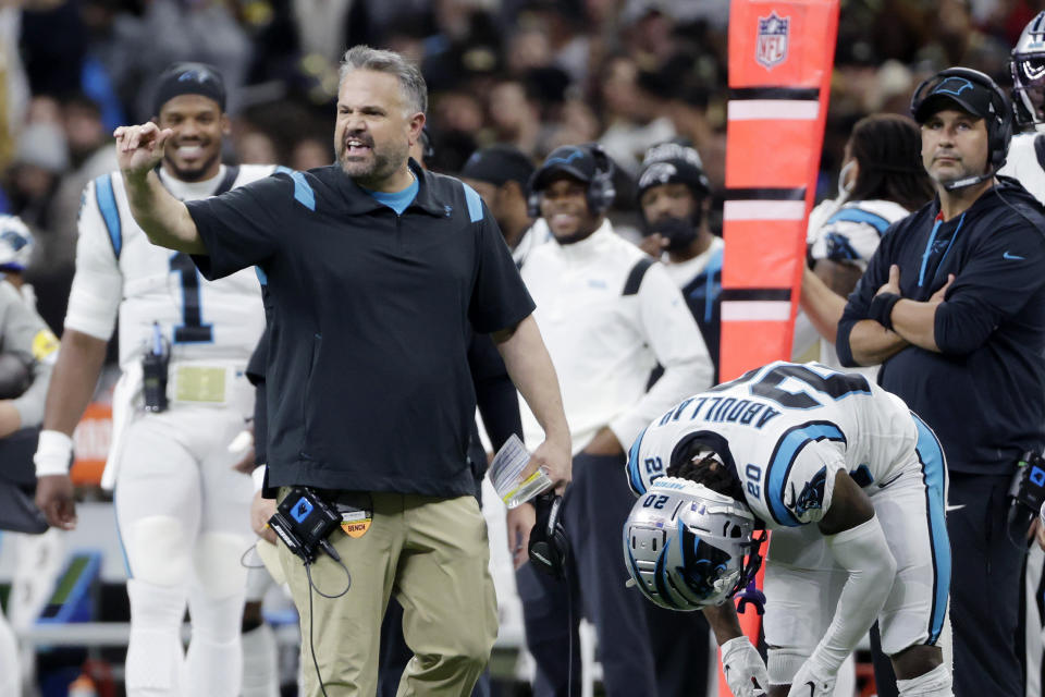 Carolina Panthers head coach Matt Rhule calls out from the bench in the first half of an NFL football game against the New Orleans Saints in New Orleans, Sunday, Jan. 2, 2022. (AP Photo/Derick Hingle)