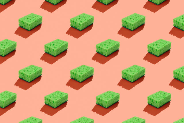 Green sponges on a pink background to symbolize green washing.