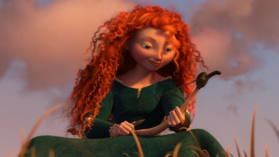 Merida carves her bow in Brave