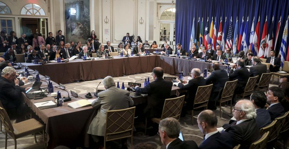 Members of the Rio Treaty organized by the Organization of American States meet to discuss sanctions on Venezuela, Monday Sept. 23, 2019, in New York. (AP Photo/Bebeto Matthews)