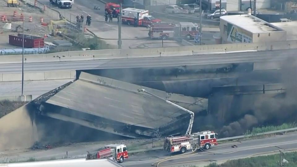 This screen grab from video provided by WPVI-TV/6ABC shows the collapsed section of I-95 with fire trucks on the scene in Philadelphia, Sunday, June 11, 2023. (WPVI-TV/6ABC via AP) (WPVI-TV/6ABC)