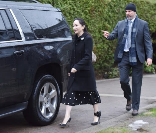 Huawei chief financial officer Meng Wanzhou leaves her Vancouver home to begin her extradition hearing in British Columbia Supreme Court, on January 20, 2020 in Vancouver, British Colombia