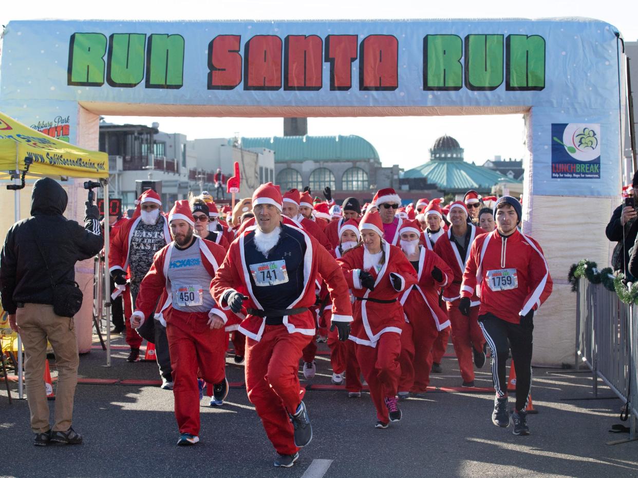 Runners brave the cold before the start of the 2018 Asbury Park Santa Run.