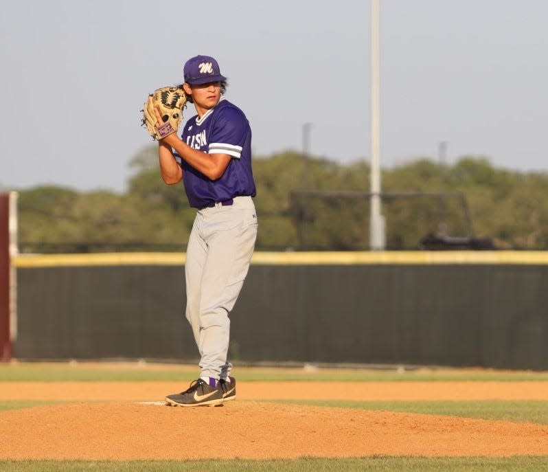 Mason High School's Blake Lewis prepares to pitch Thursday, May 19, 2022 during the Punchers' 4-3 loss to Kenedy High School in Game 1 of the 2A regional quarterfinals at Davenport High School.