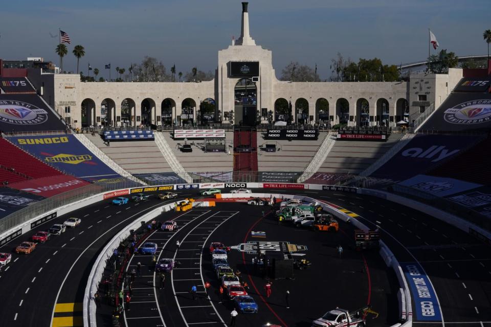 Drivers participate in a practice session Saturday at the Coliseum ahead of NASCAR's exhibition race there Sunday.
