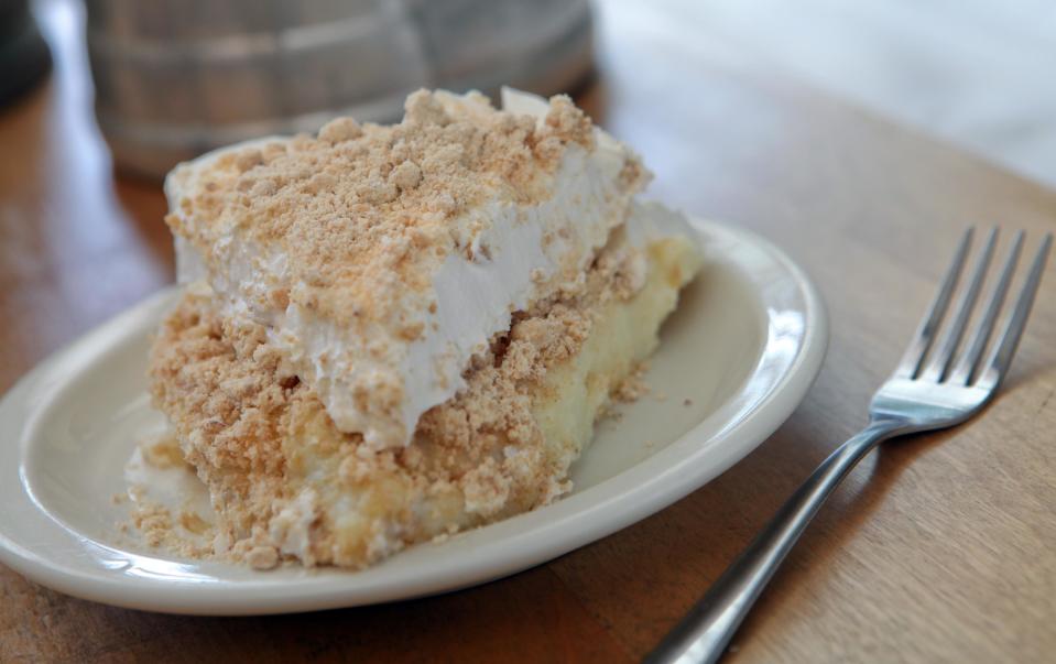 This undated image supplied by Yoder’s Restaurant in Sarasota, Fla., shows a slice of peanut butter pie. No meal is complete without trying Yoder’s famous pie, which comes in 25 varieties. The most popular flavor is peanut butter, with layers of crunchy peanut butter topping and vanilla pudding. Also popular are coconut, banana cream, strawberry and chocolate peanut butter. The restaurant serves “homestyle Amish food” and is extremely popular among locals and tourists alike. (AP Photo/Courtesy of Yoder’s Restaurant)