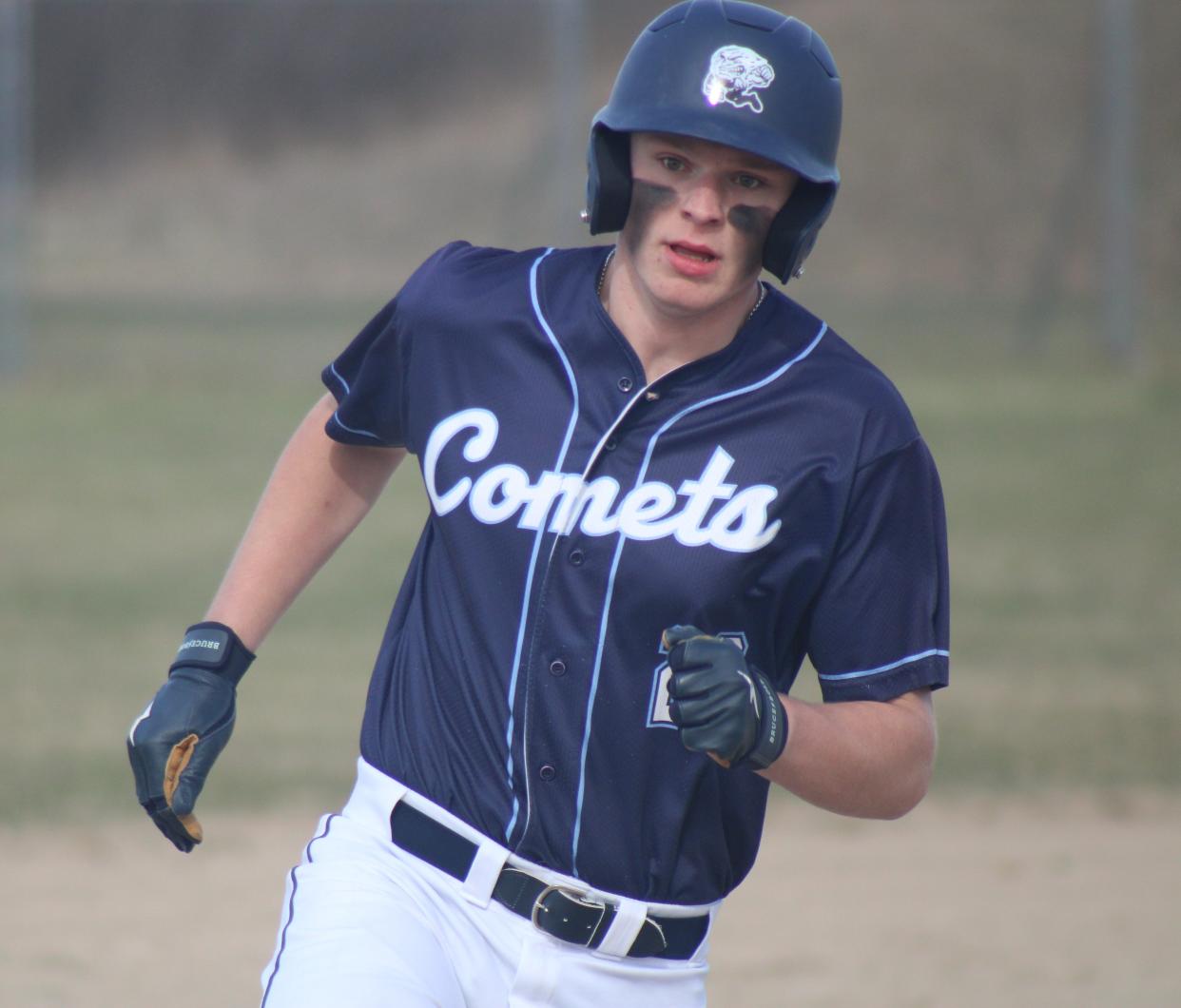 Mackinaw City senior Lucas Bergstrom heads for third base during game one against Boyne Falls on Tuesday.