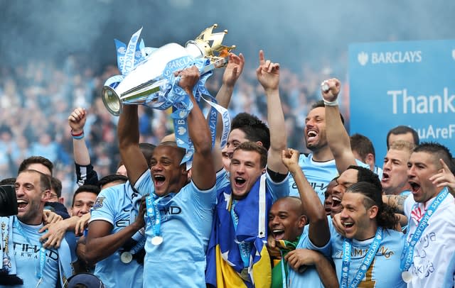 Hart (second from right) was a Premier League champion again in 2014 (Lynne Cameron/PA).