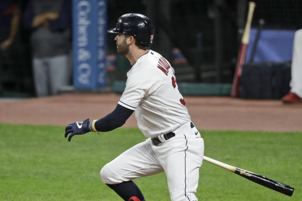 Cleveland Indians' Tyler Naquin watches his RBI single in the sixth inning in the team's baseball game against the Minnesota Twins, Tuesday, Aug. 25, 2020, in Cleveland. (AP Photo/Tony Dejak)