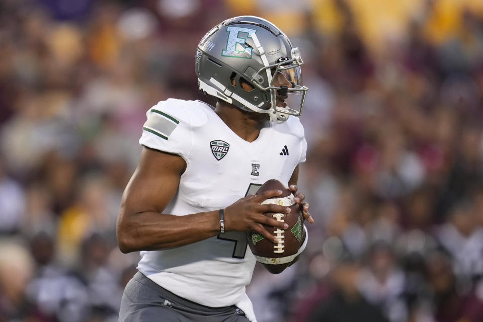 Eastern Michigan quarterback Austin Smith looks to pass during the first half of an NCAA college football game against Minnesota, Saturday, Sept. 9, 2023, in Minneapolis. (AP Photo/Abbie Parr)