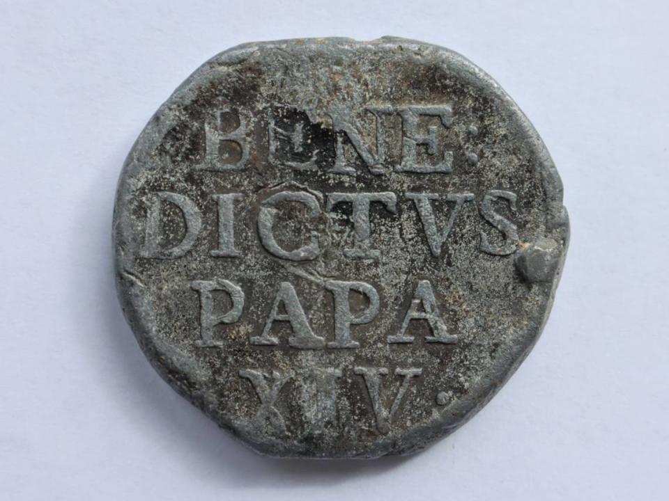 One side of the 250-year-old lead seal, or papal bulla.