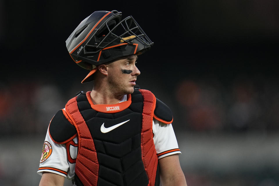 Baltimore Orioles catcher James McCann looks on in the second inning of a baseball game against the St. Louis Cardinals, Tuesday, Sept. 12, 2023 in Baltimore. (AP Photo/Julio Cortez)