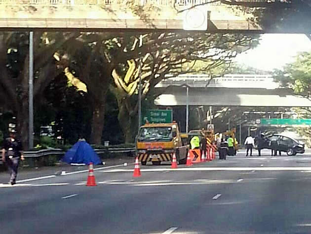 The scene of an accident on Friday morning between a lorry and a car that resulted in one death and 12 others injured. (Photo courtesy of reader Amanda)