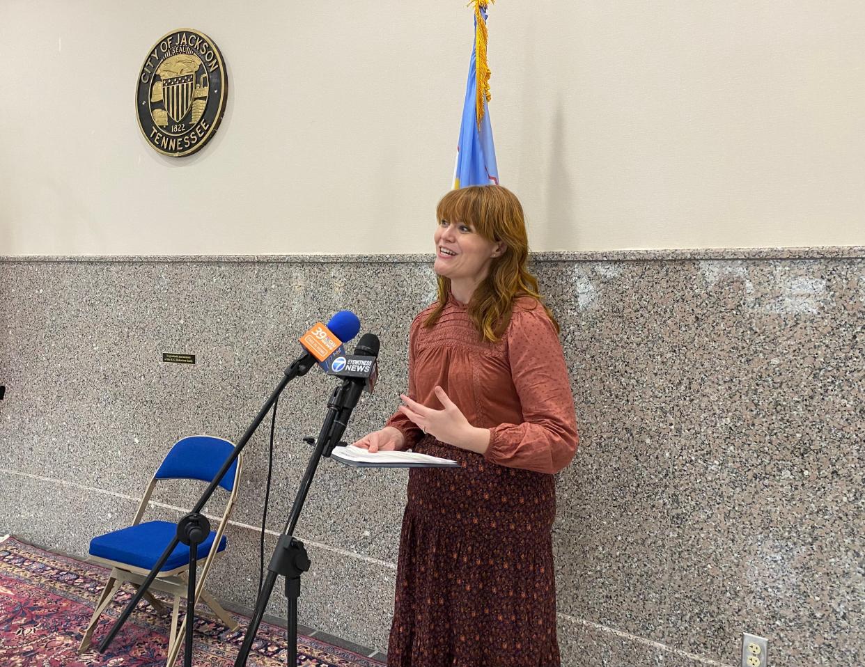 Lizzie Emmons, executive director of the Jackson Arts Council, speaks with reporters to encourage Jackson residents to apply for the flag re-design contest.