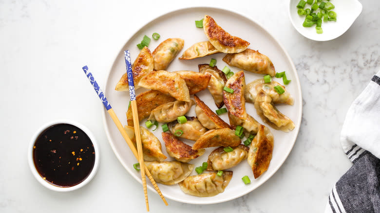 crispy vegetable potstickers on plate