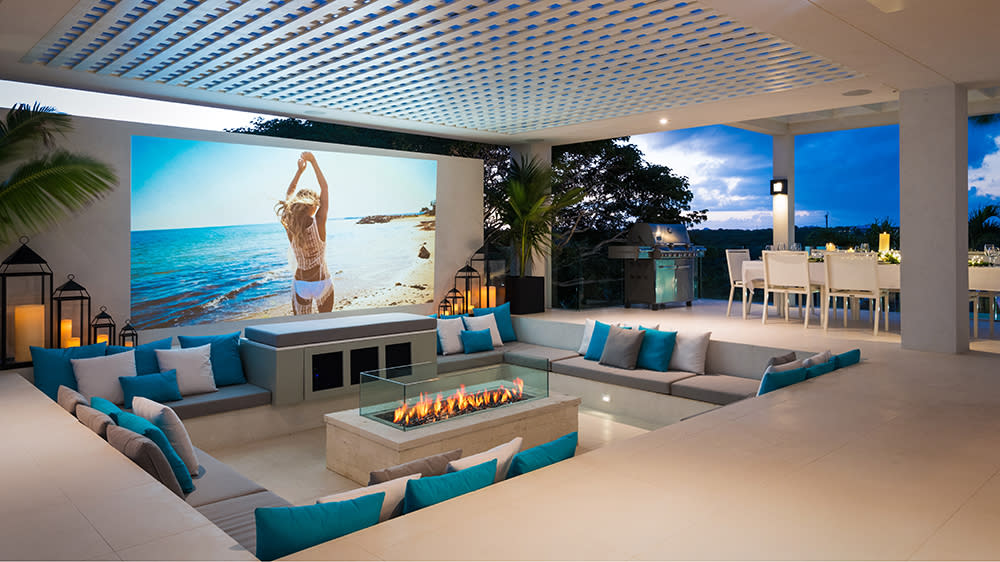 The stunning outdoor home theater with a fire pit - Credit: Steve Passmore/The Agency Turks & Caicos
