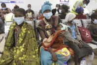 Refugees seek shelter at a centre in Afungi, Mozambique after fleeing attacks in Palma in Northern Mozambique Monday March 29, 2021. Southern African Development Community leaders will meet in Maputo, Mozambique for two days starting Thursday, April 8, 2021, to deliberate on measures to address terrorism in the northern area of the country. (AP Photo)