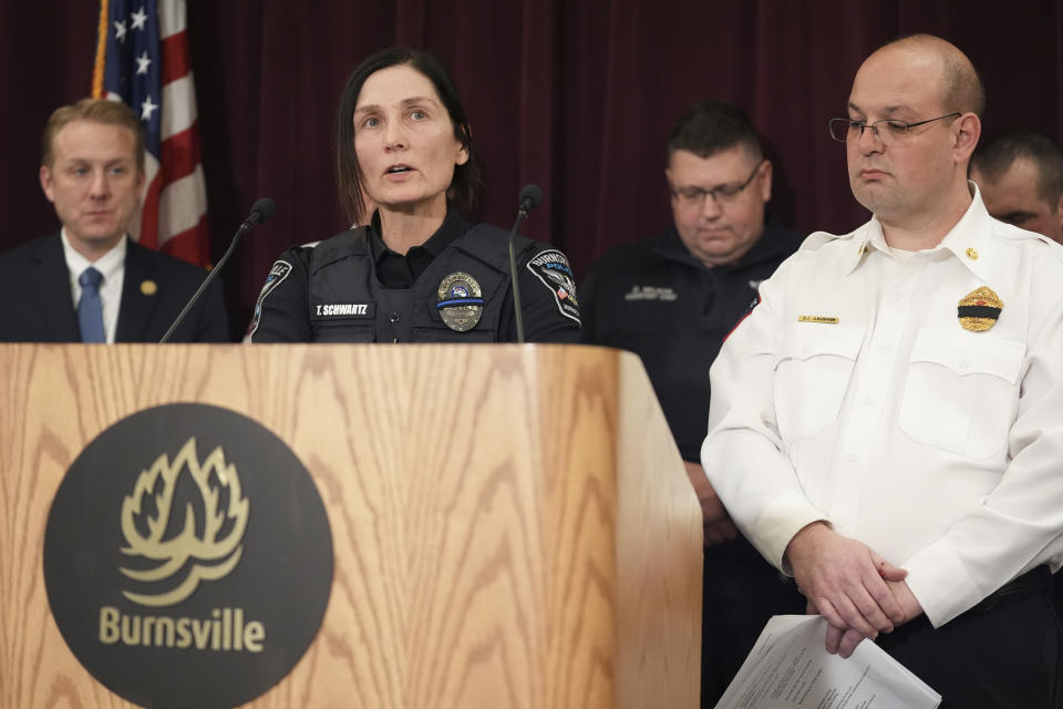 Burnsville police chief Tanya Schwartz, second from left, speaks at a press conference next to Burnsville fire chief BJ Jungmann, right, after two police officers and a first responder were shot and killed Sunday, Feb. 18, 2024, in Burnsville, Minn. (AP Photo/Abbie Parr)