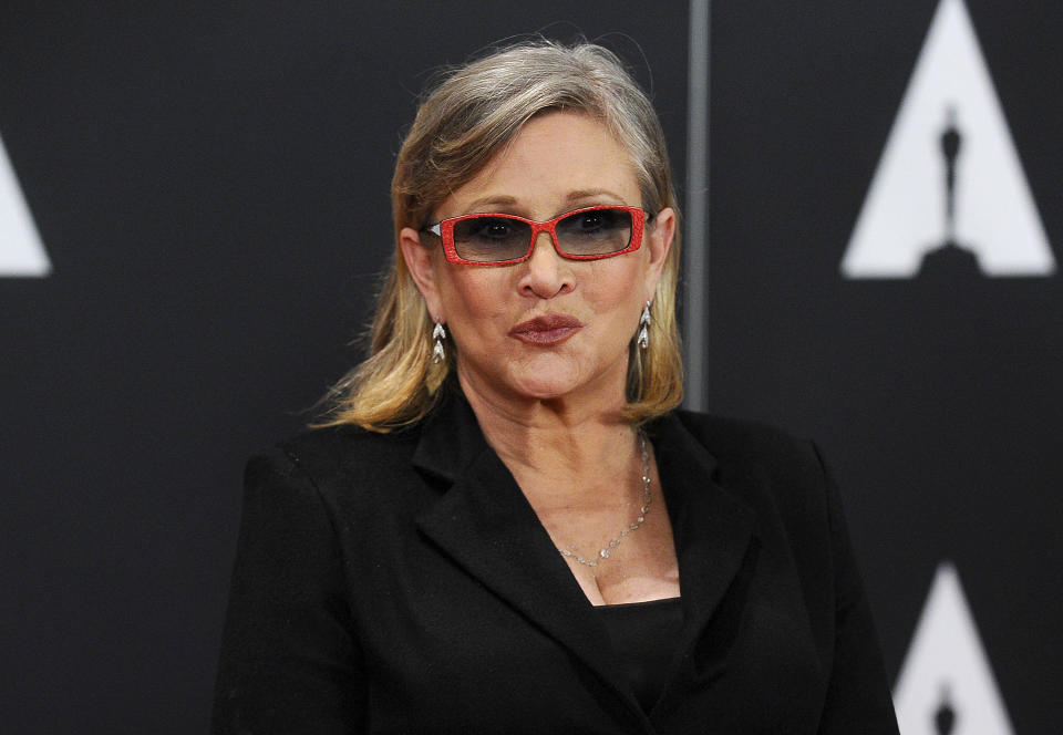 Carrie Fisher attends the 7th annual Governors Awards at The Ray Dolby Ballroom at Hollywood & Highland Center on November 14, 2015, in Hollywood, California. / Credit: Jason LaVeris/FilmMagic