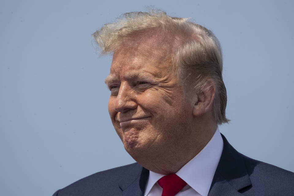 President Donald Trump smiles before viewing the SpaceX flight to the International Space Station, at Kennedy Space Center, Saturday, May 30, 2020, in Cape Canaveral, Fla. (AP Photo/Alex Brandon)