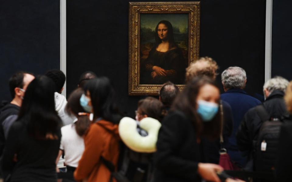 The Mona Lisa (relatively) unburdened by crowds - getty