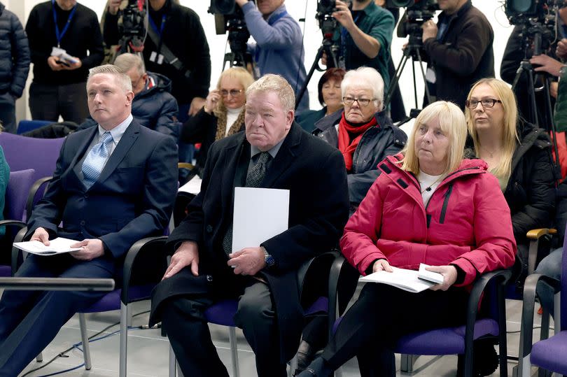 Hillsborough victims families including Margaret Aspinall (front-right) listen to Bishop James Jones speaking at the press conference in Liverpool, as the government responded to a six year old report into the experiences of the Hillsborough families.