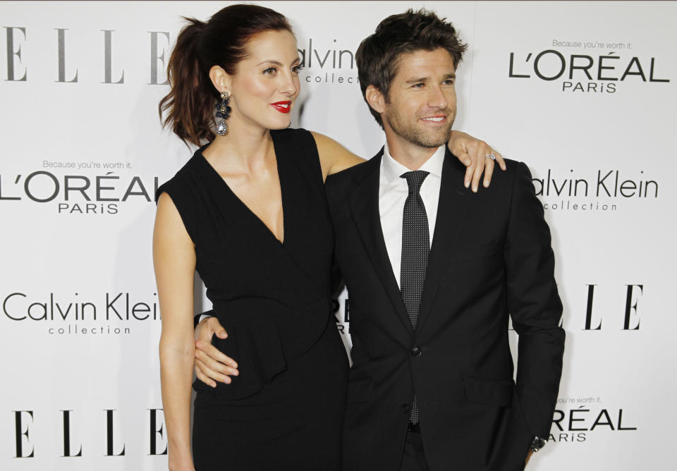 Actress Eva Amurri and husband Kyle Martino arrive as guests at the 19th Annual ELLE Women in Hollywood dinner in Beverly Hills, Callifornia October 15, 2012. The event honors women who have had a profound impact on the film industry.  REUTERS/Fred Prouser  (UNITED STATES - Tags: ENTERTAINMENT)