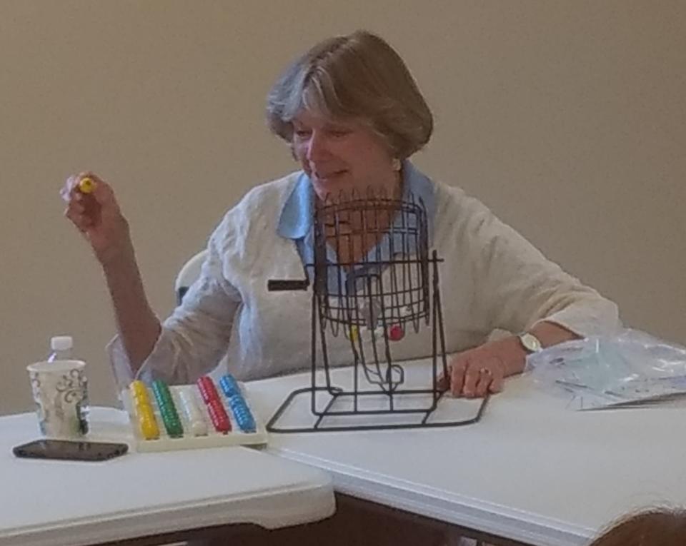 Patricia Stange calls a Bingo number during Grace’s Place at Grace Lutheran Church in Vestal. Grace’s Place provides respite care for caregivers of older people with Alzheimer’s, dementia and other age-related issues.