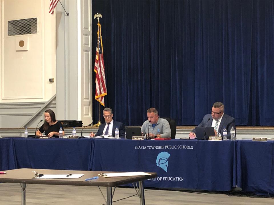 From left, Sparta Board of Education Vice President Leigh McMichael, attorney Marc Zitomer, President Kurt Morris and district superintendent Matt Beck listen to public comment at Mohawk Avenue School Thursday, Sept. 28, 2023.