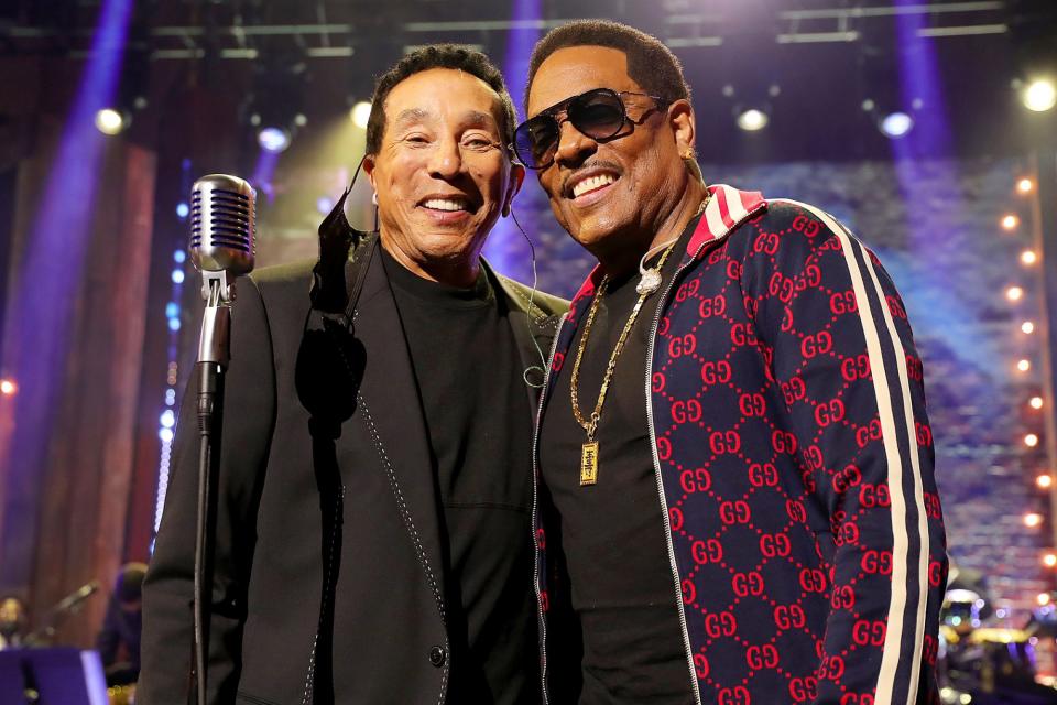 <p>Smokey Robinson and Charlie Wilson pose together at the 2020 Soul Train Awards, presented by BET, on Sunday in L.A. </p>
